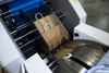 Neue Welt Eine quadratische Bodenbeutelmaschine mit verdrehtem Griff online